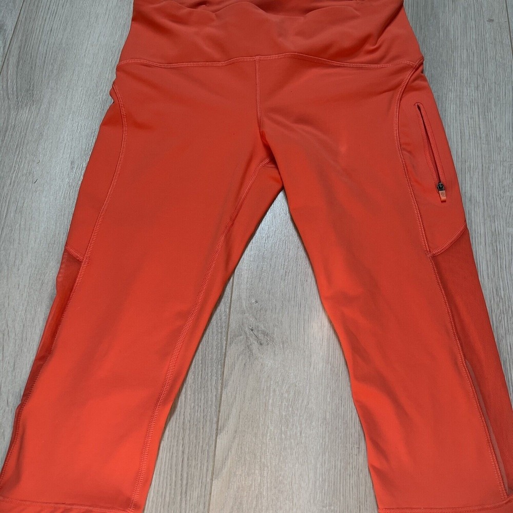 Lululemon Athletica Coral Orange Capris Leggings Side Zipper Pocket Mesh Sz 8